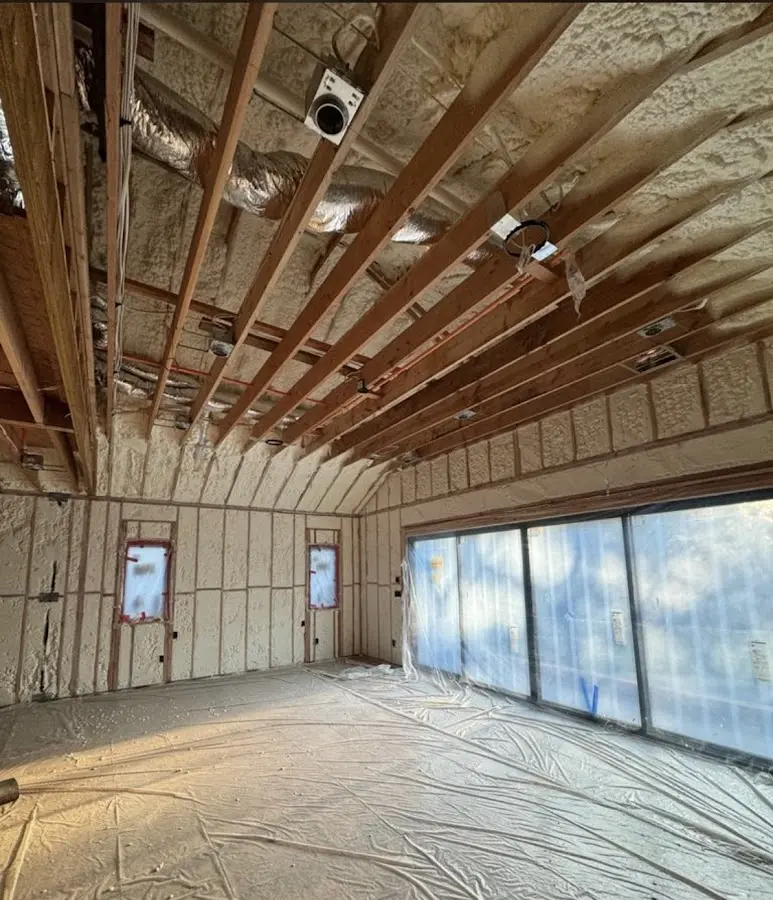 Interior walls and ceiling insulated with spray foam during new construction in Ellington